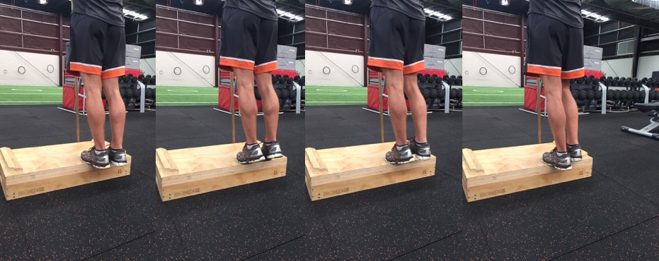 Figure 2: Eccentric heel lowers (2-legged calf raise up, 1 leg lowers down)