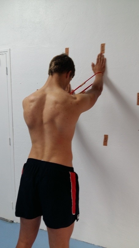 Serratus anterior wall slide: start position